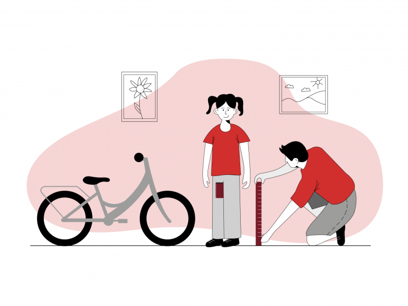 pomar długości nogi dziecka w celu dopasowania rozmiaru roweru